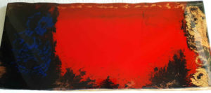 Le Garçon au yeux Pourpres oeuvre original sur un planche avec la couleur rouge dominante, noire, or, bleu